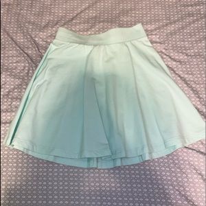 Mint green mini skirt
